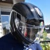 The AGV Sportmodular Carbon helmet on my head looking down.