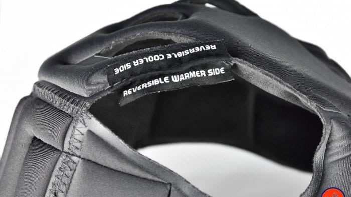 AGV Sportmodular Carbon Gloss helmet crown comfort liner tag showing reversibility instructions.