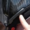 The sliding switch on the helmet for extending or retracting the sun lens.
