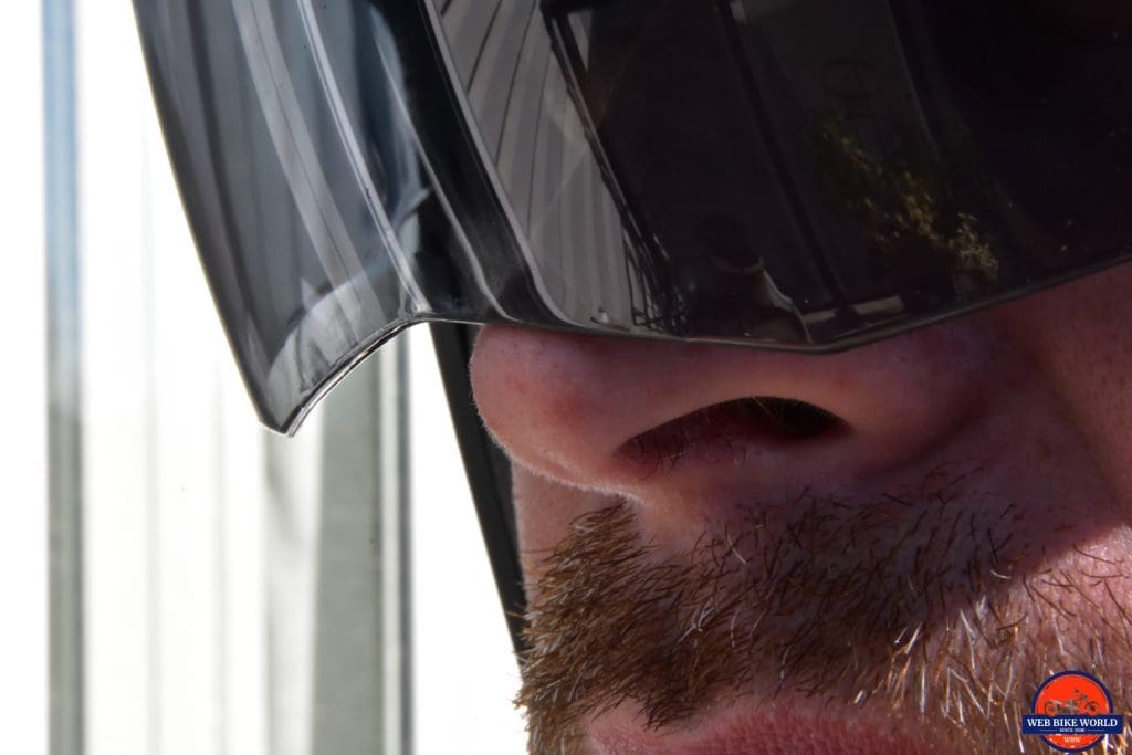 The sun lens on the AGV Sportmodular Carbon helmet shown touching my nose.