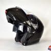 AGV Sportmodular Carbon Gloss helmet chinbar raised and sun lens retracted.