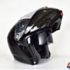 AGV Sportmodular Carbon Gloss helmet with chinbar raised and sun lens lowered.