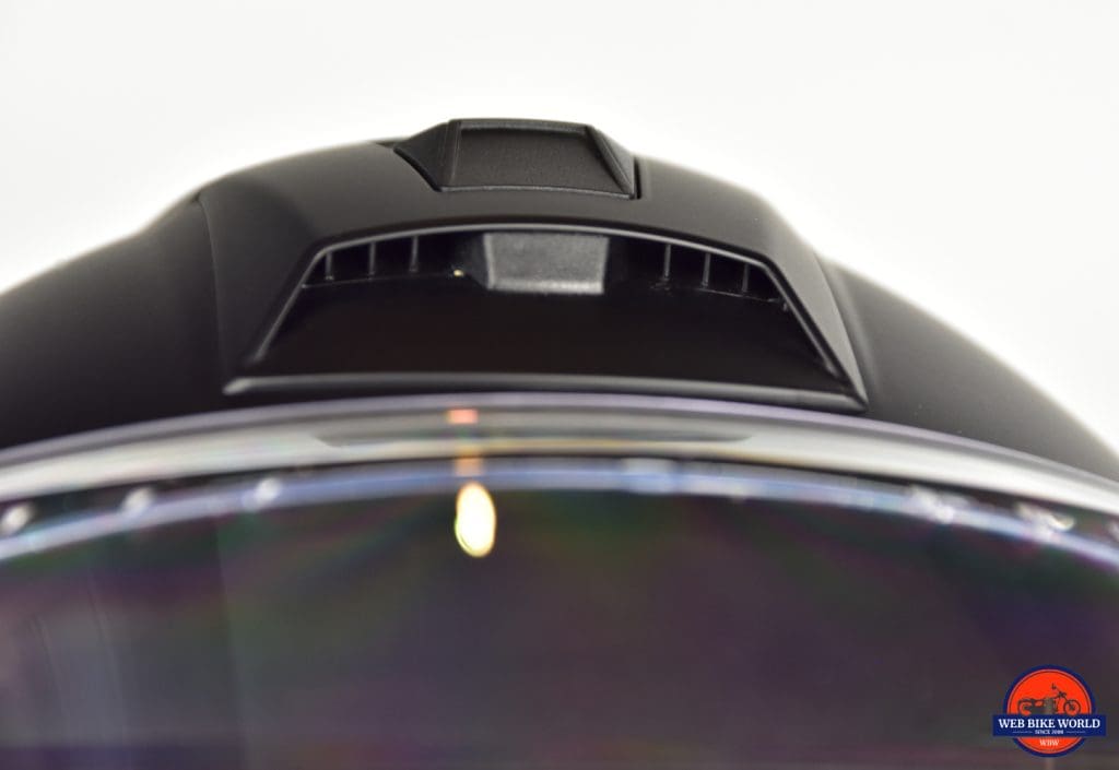 AGV Sportmodular Carbon Gloss helmet top vent open closeup.