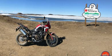 My 2017 Honda Africa Twin Next to the Tuktoyaktuk Entrance Sign