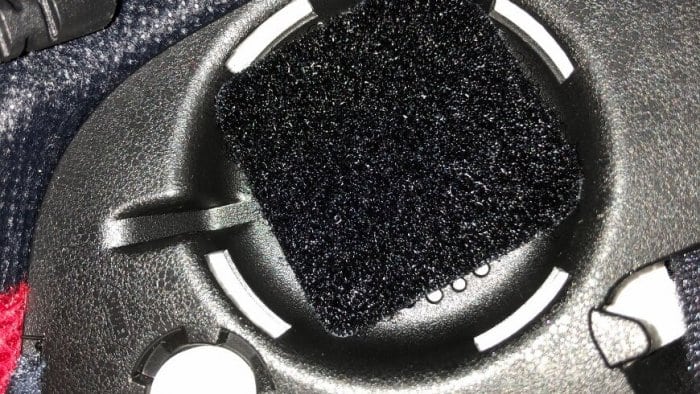 Velcro tab attached to helmet