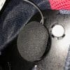 Second speaker attached to velcro tab in helmet