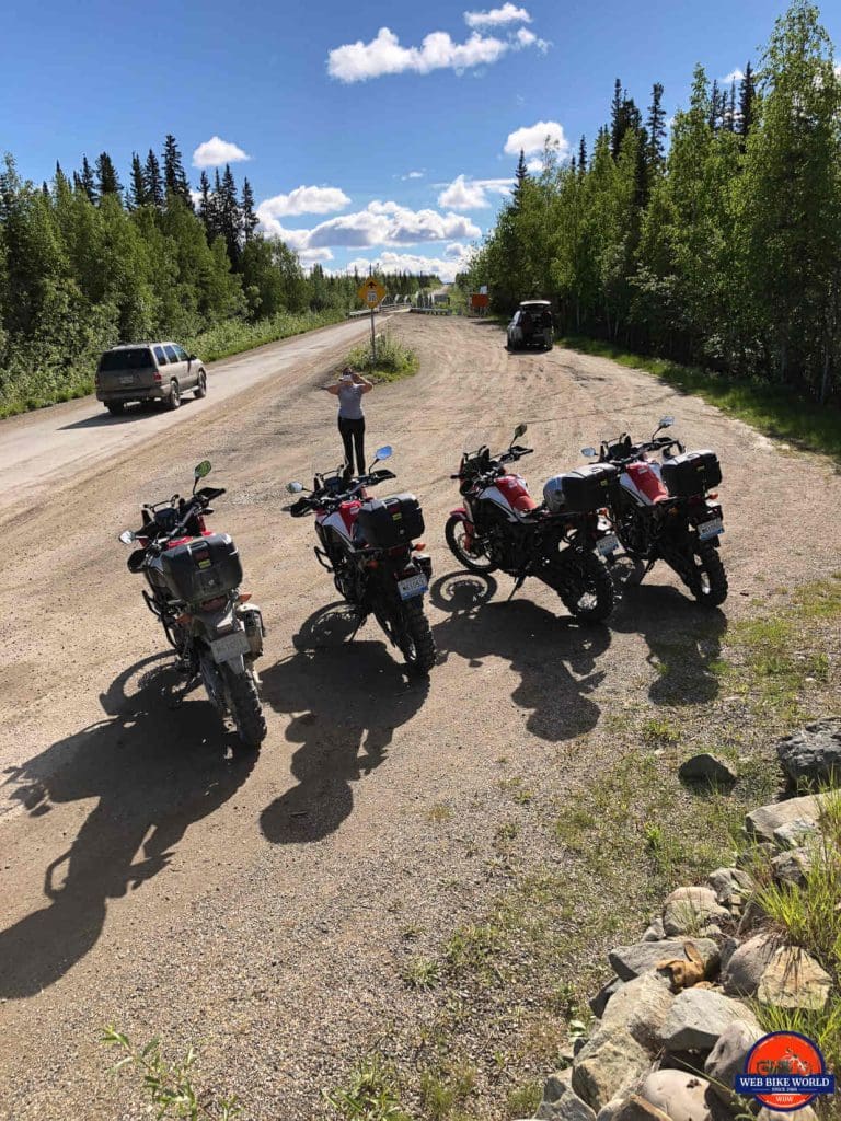 Tammy taking a group photo at the beginning of the Dempster Highway.