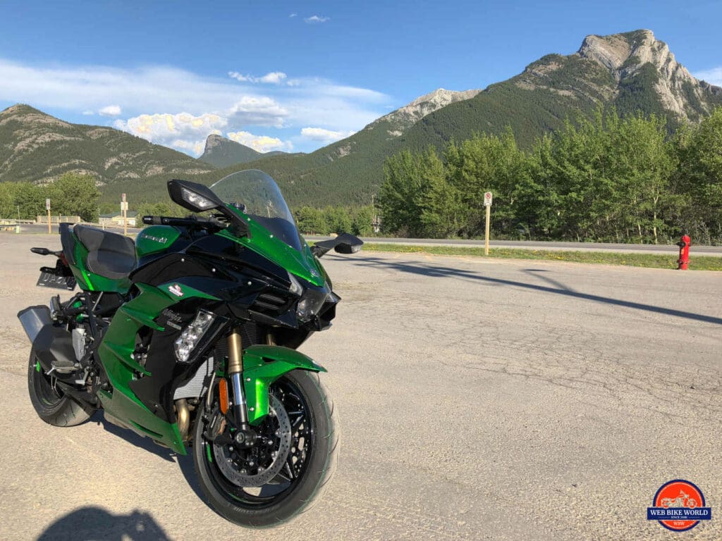 2018 Kawasaki Ninja H2SXSE with mountains in the background.