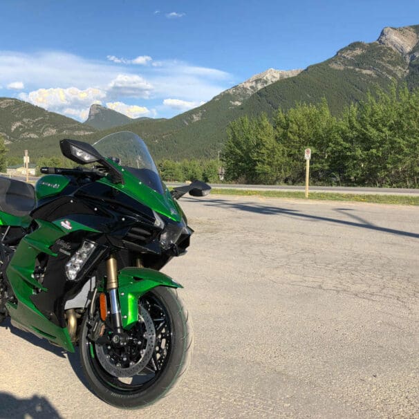 2018 Kawasaki Ninja H2SXSE with mountains in the background.