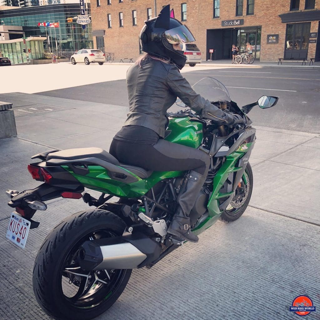 Catwoman riding a 2018 Kawasaki Ninja H2SXSE.