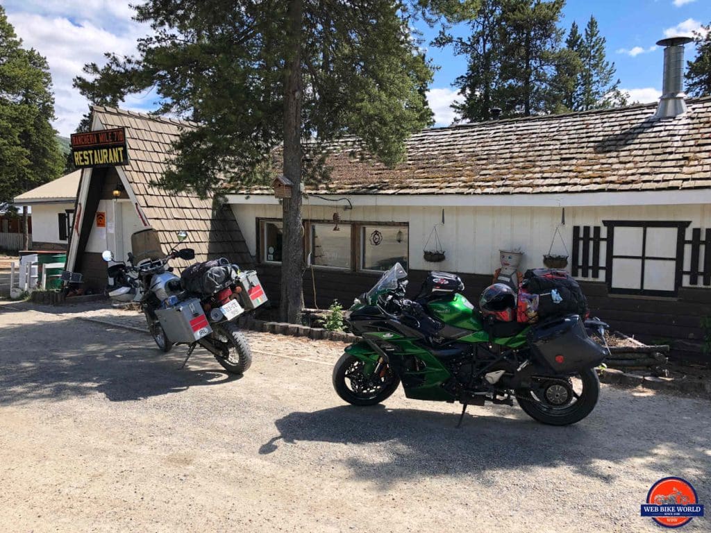 The Rancheria Mile 710 Restaurant with my Kawasaki Ninja H2SX SE and a European KLR650 in front.