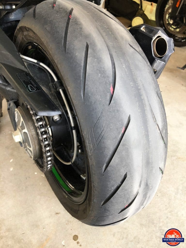 My worn out Bridgestone Battlax tires on my 2018 Kawasaki Ninja H2SX SE after 8200 kms.