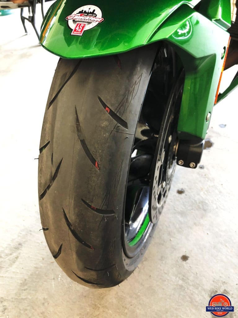 My worn out Bridgestone Battlax tires on my 2018 Kawasaki Ninja H2SX SE after 8200 kms.