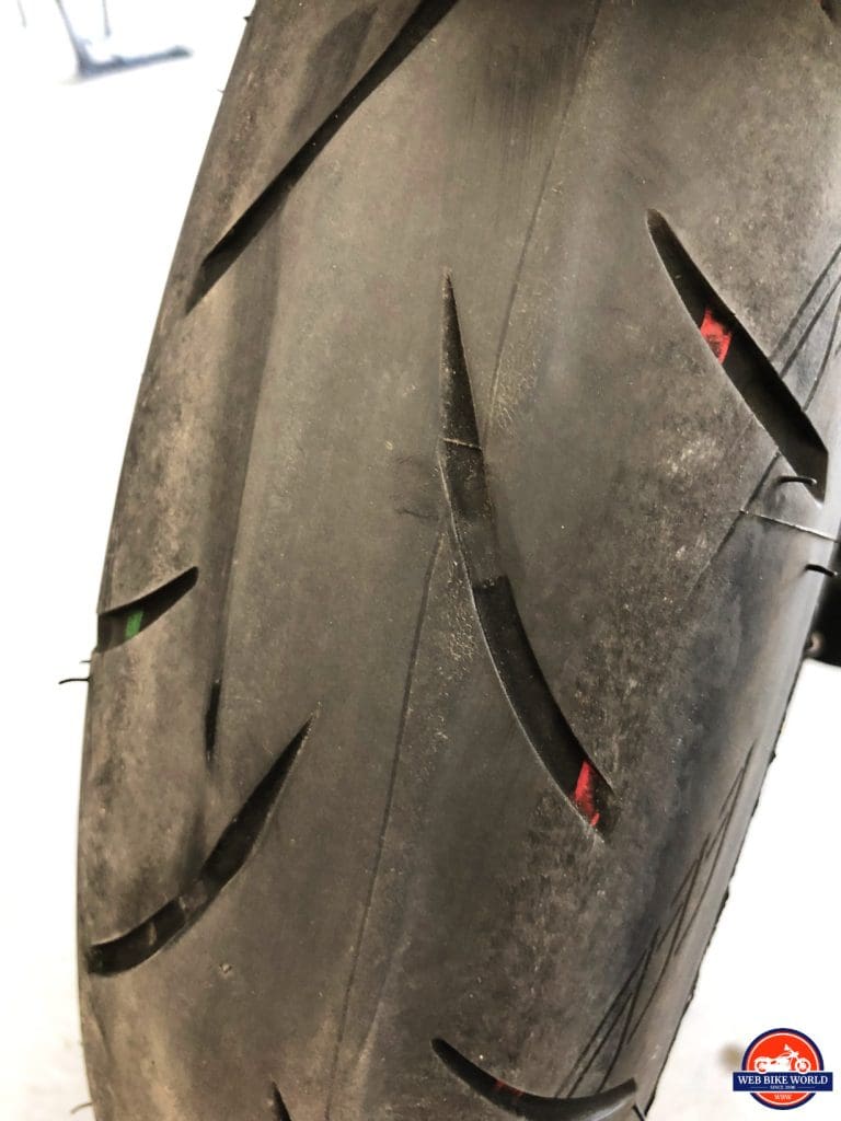 My worn out Bridgestone Battlax tires on my 2018 Kawasaki Ninja H2SX SE after 8200 kms.