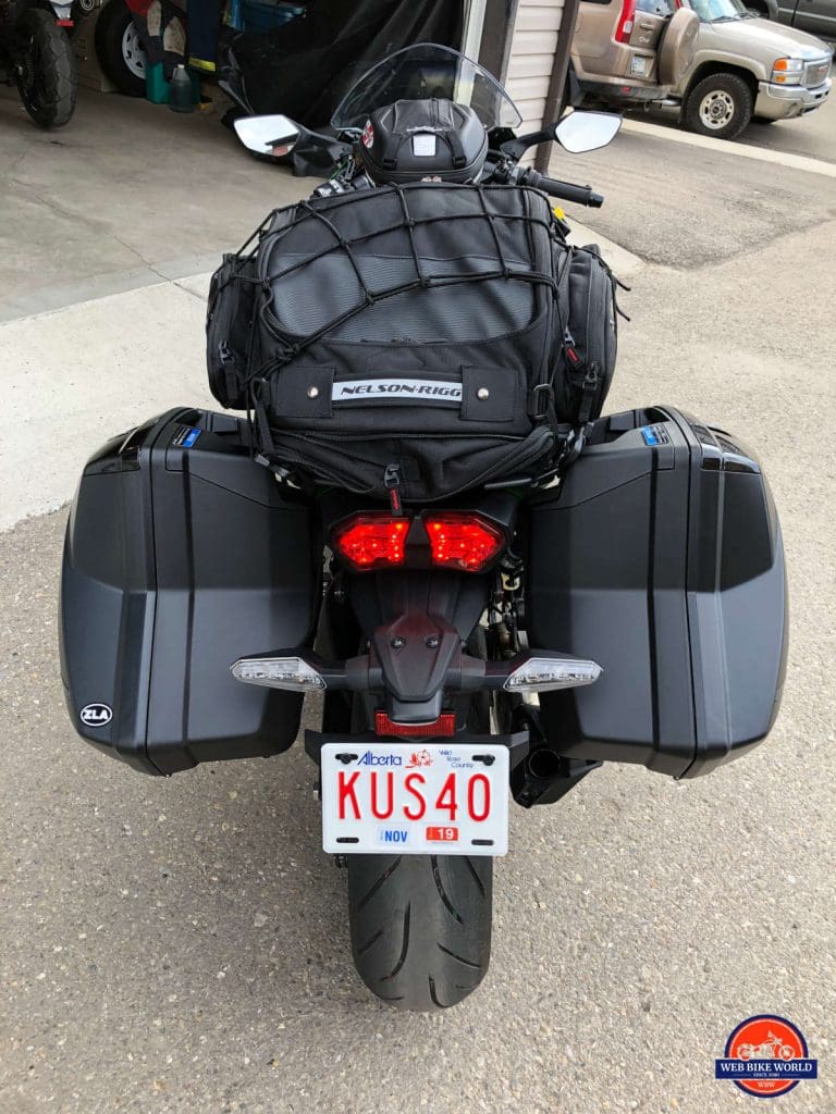 2018 Kawasaki Ninja H2SXSE with luggage installed viewed from the rear.