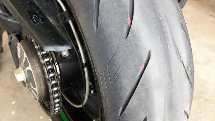 A worn out Bridgestone Battlax rear tire.