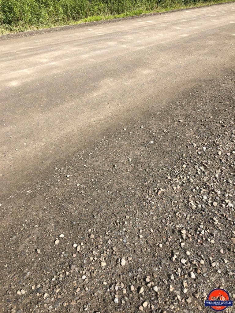 The hard packed section of the Dempster highway with potholes beginning to form.