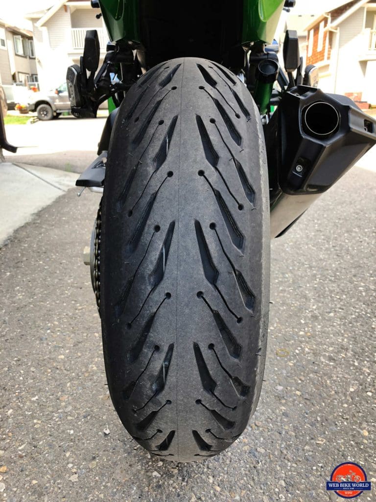 A photo of a brand new Michelin Road 5 rear tire after installation on the Ninja H2SX SE.