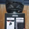 ZOX Primo C Track Helmet Rear view on top of ZOX Box