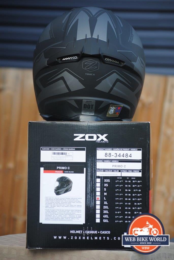 ZOX Primo C Track Helmet Rear view on top of ZOX Box