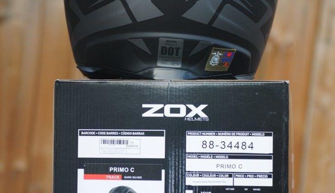 ZOX Primo C Track Helmet Rear view on top of ZOX Box