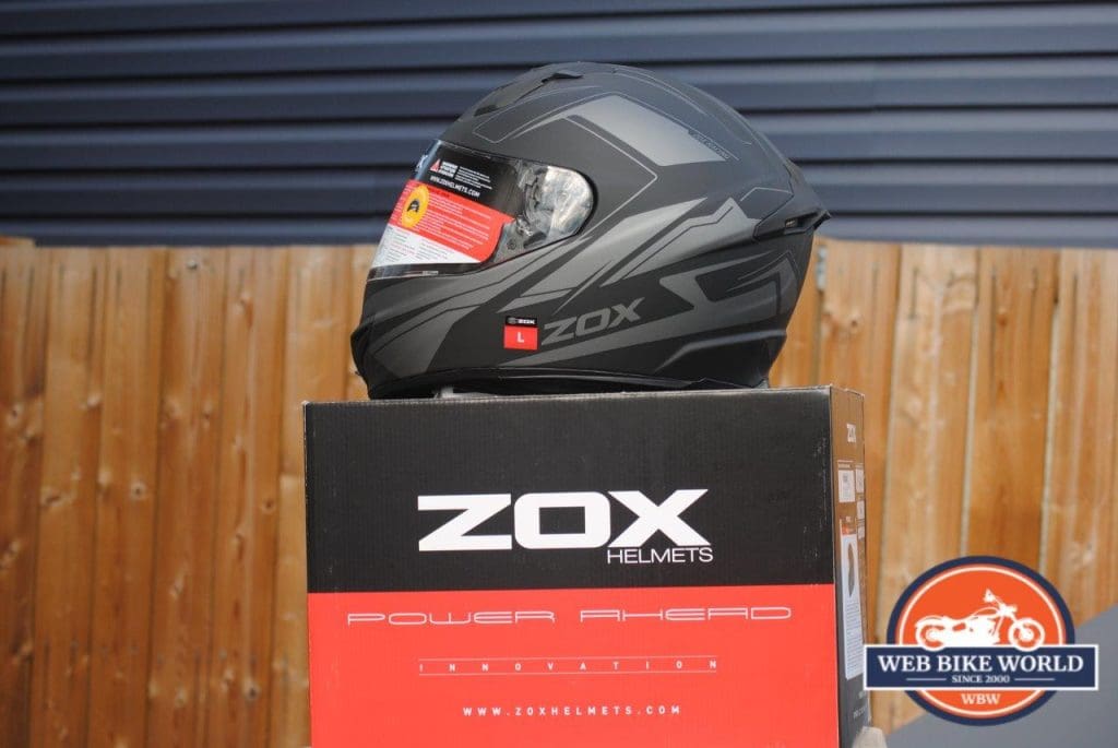 ZOX Primo C Track Helmet on top of ZOX Box