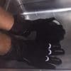 REAX Ridge Waterproof Gloves undergoing a waterproof test in sink