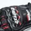 Dainese D1 Druid Long Gloves closeup of Dainese logo on back of hand