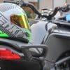 NENKI NK856 Helmet resting on Motorcycle