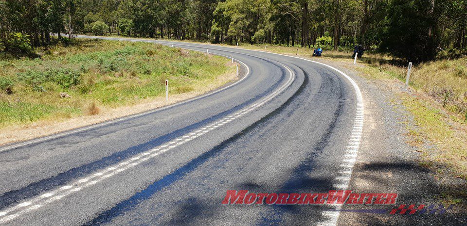 Melting tar on Oxley highway fix water