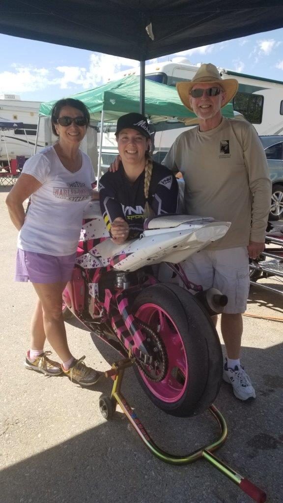 Brittany with parents at track