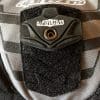 Alpinestars velcro and snap back protector attachment system