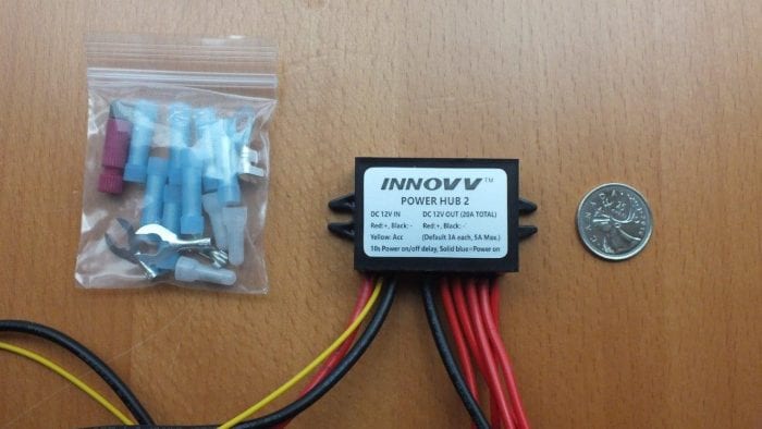 NNOVV Power Hub 2 with coin for scale