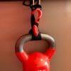 Tackform Enduro Supporting 15 pound kettlebell