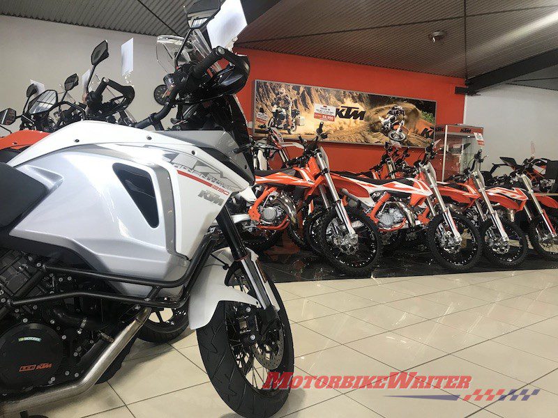 KTM test ride demo motorcycle sales showroom selling motorcycles spiral