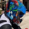 Icon Airflite Inky Helmet side view of FliteShield size and locking knob as well as the lateral field of vision