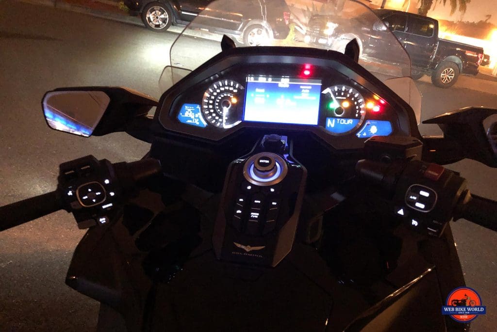 Gold Wing DCT dash and handlebars at night.