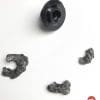 Cheekpad anchor that pulled out of the Nolan N100-5 helmet with N-Com B901L installed.