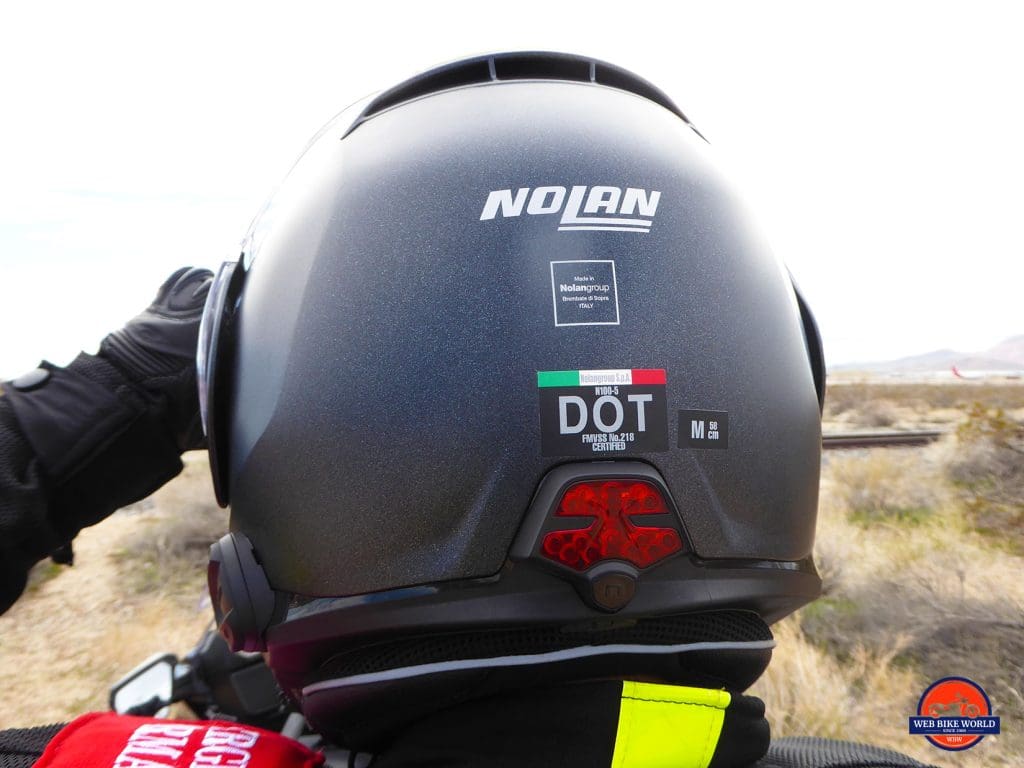 Rear view of the Nolan N100-5 helmet with N-Com B901L and ESS light installed.