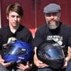 Father and son holding the Shoei GT Air and GT Air II helmets.