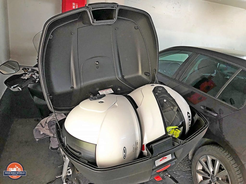 Trunk space on a 2019 Ducati Multistrada 1260S holding two full face helmets along with other gear.