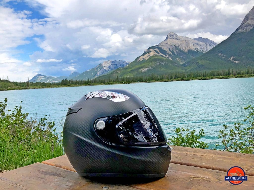 The Klim K1R helmet by a lake.