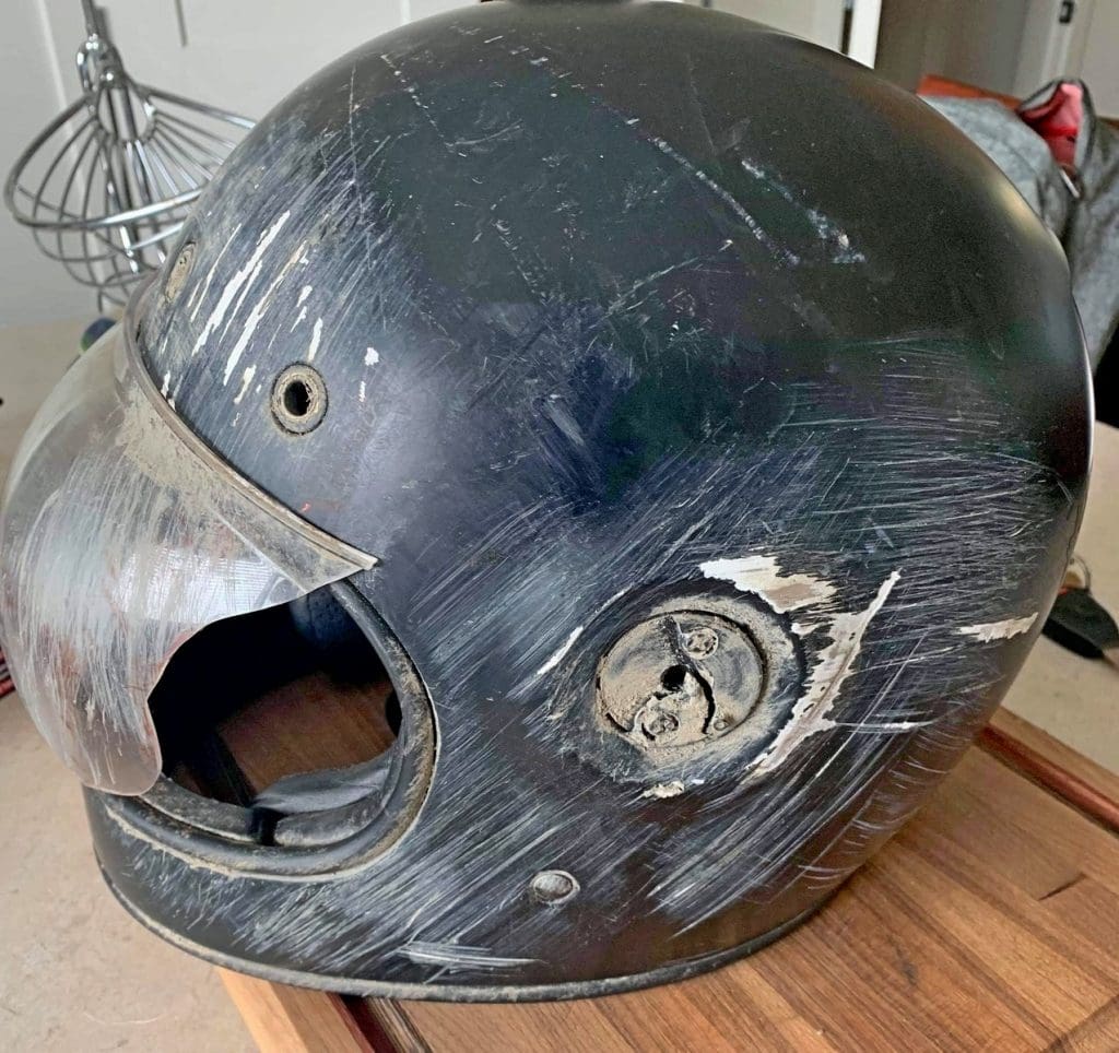 A Bell Bullitt helmet that has been crashed in.
