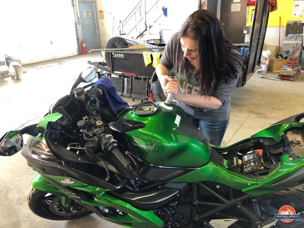 Kate polishing the paint on my Ninja.