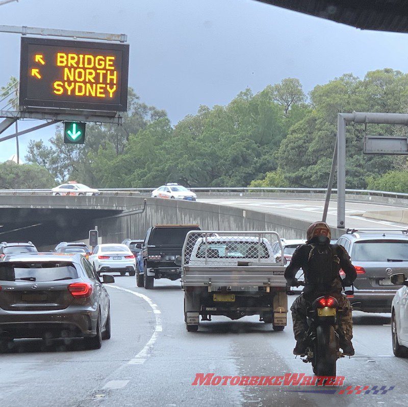 Commuting traffic lane filtering speed wet NSW sydney police commuting