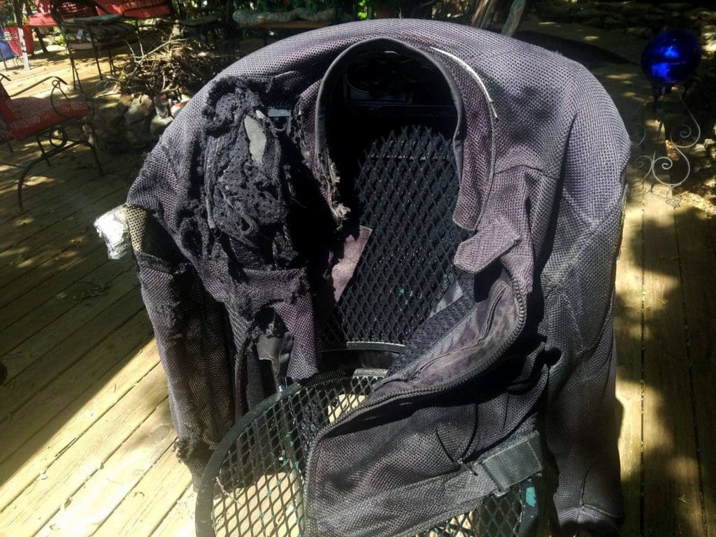 A destroyed mesh motorcycle jacket.