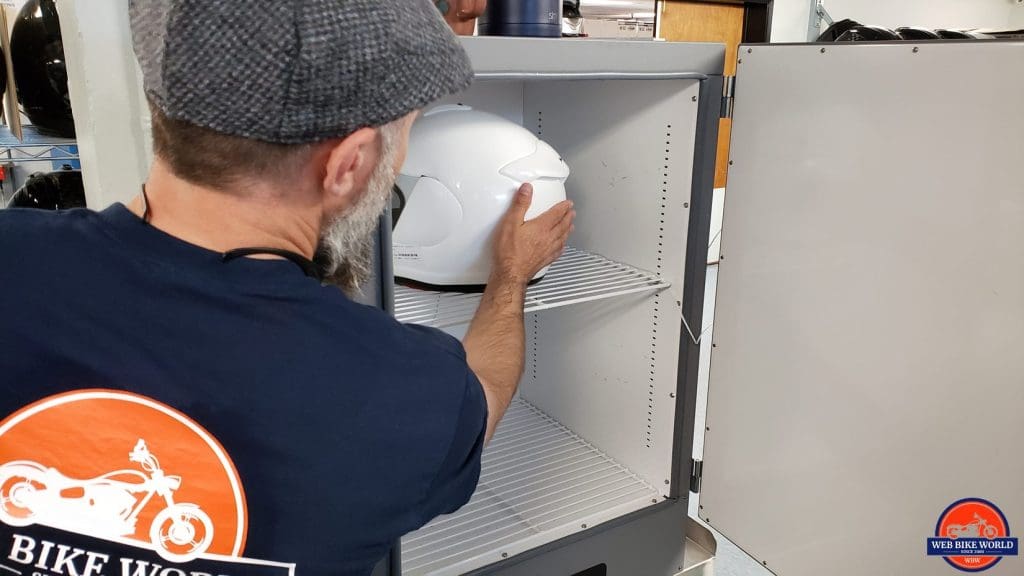 A helmet in the oven before testing at the Snell laboratory.