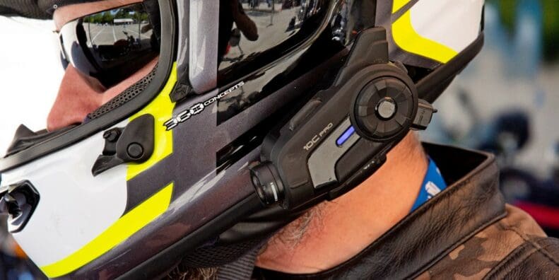 The Sena 10C Pro installed on an Arai DT-X helmet.