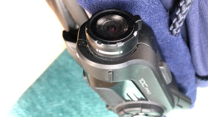 Tiny dust particles trapped under the camera glass in my Sena 10C Pro