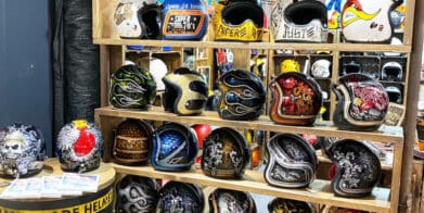 A collection of custom helmets from EICMA 2019 displays.